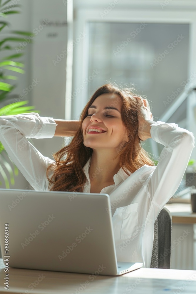 Poster woman sitting in front of a laptop computer. suitable for technology and remote work concepts