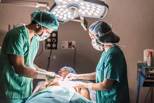 Doctors operating