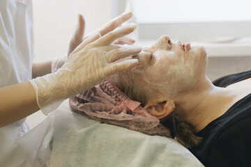 Woman Receiving Facial Massage