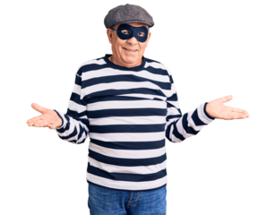 Senior handsome man wearing burglar mask and t-shirt smiling showing both hands open palms, presenting and advertising comparison and balance