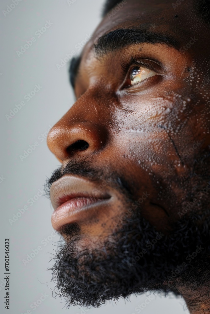 Poster A detailed shot of a man with a beard. Suitable for various projects