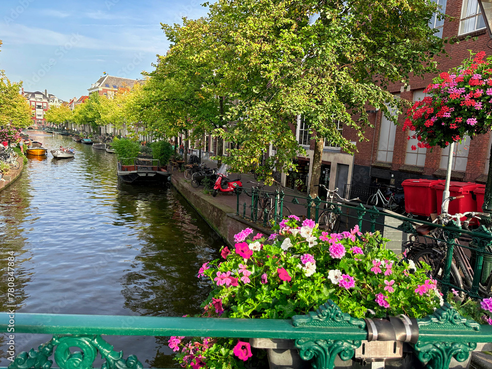 Canvas Prints Beautiful view of city street with buildings and water canal