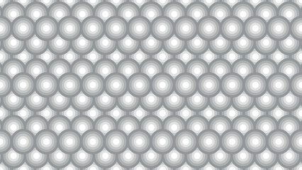A pattern of circles in various shades of gray