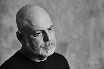 Fototapeta premium portrait adult man bald white beard face expression happy thoughtful male model gentleman in black clothes image