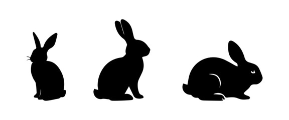 Silhouettes of easter bunnies isolated on a white background. Set of different rabbits silhouettes for design use.