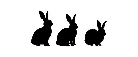 Silhouettes of easter bunnies isolated on a white background. Set of different rabbits silhouettes for design use.