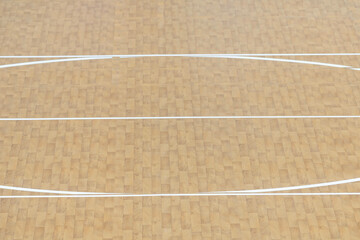 Wooden floor basketball, badminton, futsal, handball, volleyball, football, soccer court. Wooden floor of sports hall with white marking lines on wooden floor indoor, gym court
