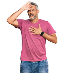 Middle age grey-haired man wearing casual clothes touching forehead for illness and fever, flu and...