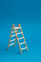 Two ladders leaning against each other