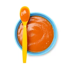 Fotobehang Delicious baby food in bowl and spoon isolated on white, top view © New Africa