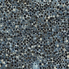 Abstract blue denim bubbles with golden edges create a captivating, porous surface, resembling organic forms in a marine landscape.
