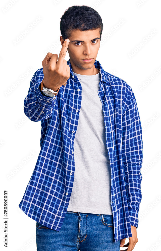 Canvas Prints young african amercian man wearing casual clothes showing middle finger, impolite and rude fuck off 