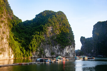 beautiful limestone rocks and secluded beaches in Ha Long bay, UNESCO world heritage site, Vietnam - 780890473