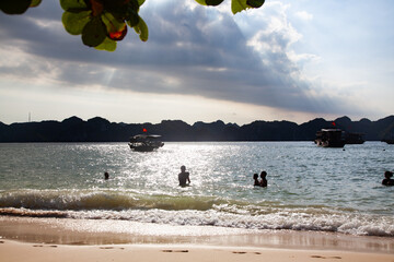 beautiful limestone rocks and secluded beaches in Ha Long bay, UNESCO world heritage site, Vietnam - 780890486