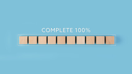 Processing is 100% complete, The work process is complete, wooden blocks lined up on a blue...
