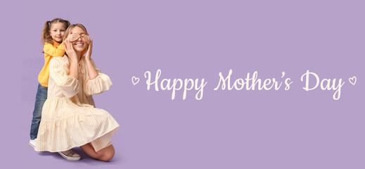 Mother playing with her child on lilac background. Mother's Day