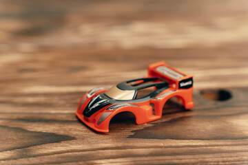 Toy Car on Wooden Table