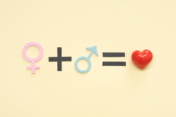 Female plus male equals love equation on beige background