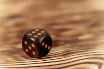 Close-Up of Dice on Wooden Surface