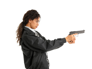 African-American female police officer with gun on white background