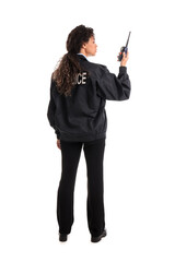 African-American female police officer with radio transmitter on white background