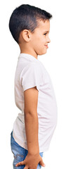 Little cute boy kid wearing casual white tshirt looking to side, relax profile pose with natural face with confident smile.