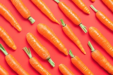  Fresh orange carrots on vibrant red background, arranged in a top view flat lay composition, perfect for healthy food concepts © SHOTPRIME STUDIO