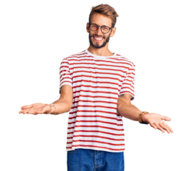 Handsome blond man with beard wearing casual clothes and glasses smiling cheerful with open arms as friendly welcome, positive and confident greetings