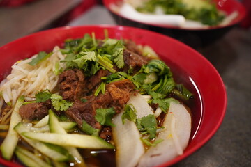braised beef knife shaved noodle soup