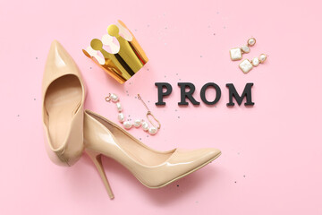 Word PROM with female shoes, crown and accessories on pink background