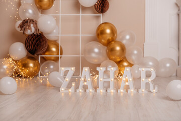Glowing letters, name Zahar. Balloon decoration for first birthday. 