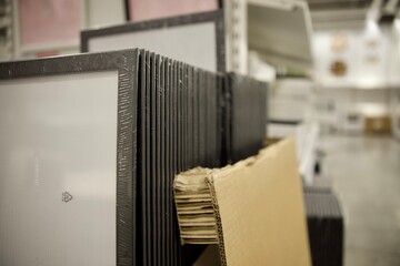 A stack of frames in a store on the counter