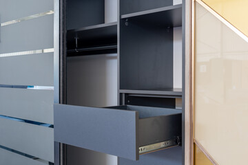 Cabinet furniture. Sections of built-in wardrobe close-up
