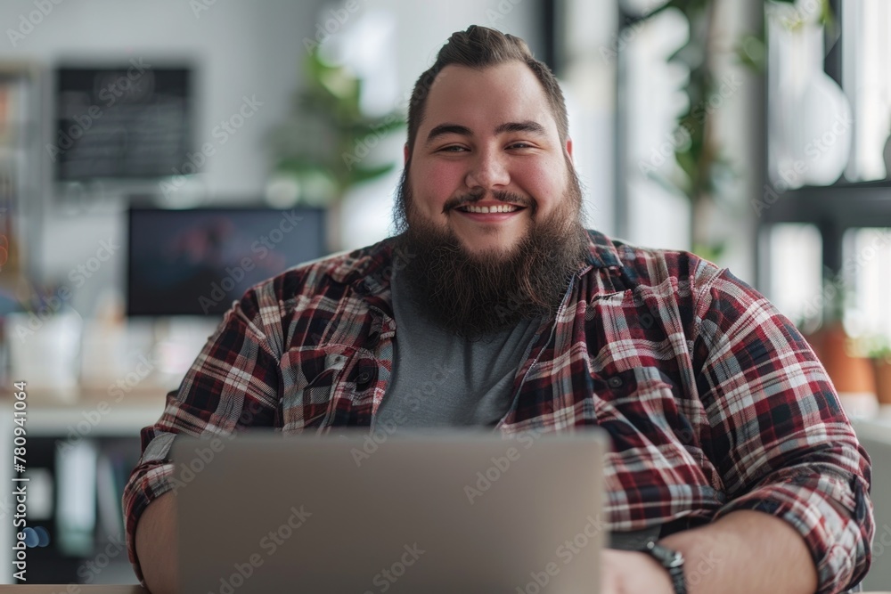 Aufkleber a man sitting at a table with a laptop. ideal for illustrating modern work environments