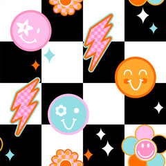 Abstract seamless funny pattern with colourful smile faces, flowers and lightning on checkered  background. Retro groovy retro style