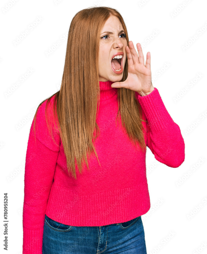 Wall mural Young irish woman wearing casual clothes shouting and screaming loud to side with hand on mouth. communication concept.