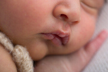 Little tiny newborn human baby tenderness