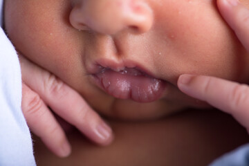 Newborn baby tiny little lips mouth body part