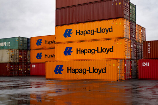 German Hapag-lloyd Shipping containers largest shipping and logistics company stacked in port, Logistics and supply chain management, Frankfurt, Germany - January 21, 2024