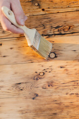  hand paints wooden boards.Oil and varnish for wood. Impregnation of a wood with protective oil. Impregnation of wood with oil.Protecting the wooden surface from damage. - 780962087