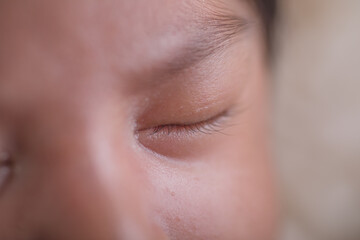 Newborn baby closed clse up eye