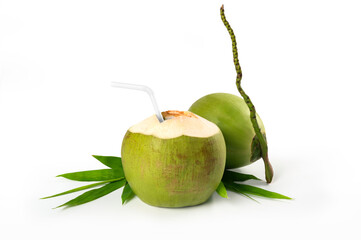Fresh young coconuts with leaves isolated on white