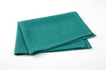 Green folded napkin isolated on white background - 780973426