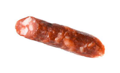 Piece of thin dry smoked sausage isolated on white
