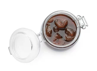  Jar of tasty sweet fig jam isolated on white © New Africa