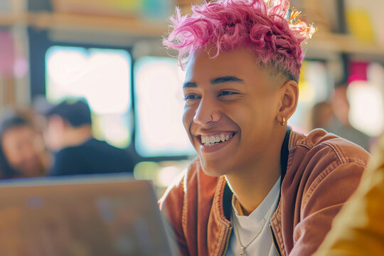 Cheerful mixed race non binary teenager enjoying technological lesson at university classroom