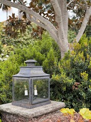 Fototapeta premium rustic glass lantern in the garden