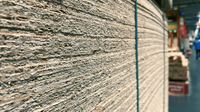 New Particle Board Sheets in Stock. Premium Construction Materials for Your Home Renovation and DIY Projects. Stacked Chipboards and Boards Ready for Purchase at Hardware Store or Lumber Yard. Closeup