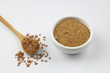 Pile of flax seeds isolated on white background