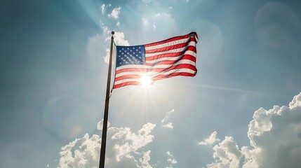 Generative AI : An american flag backlit by the sun against a blue sky with clouds